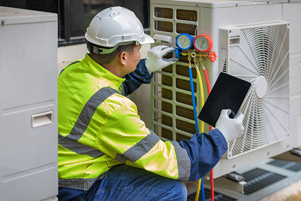 Professional Heat Pump Repair technician working in Grapeville, PA
